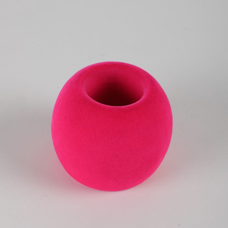 Bright pink round pen stand made from eco-friendly biodegradable rubber foam